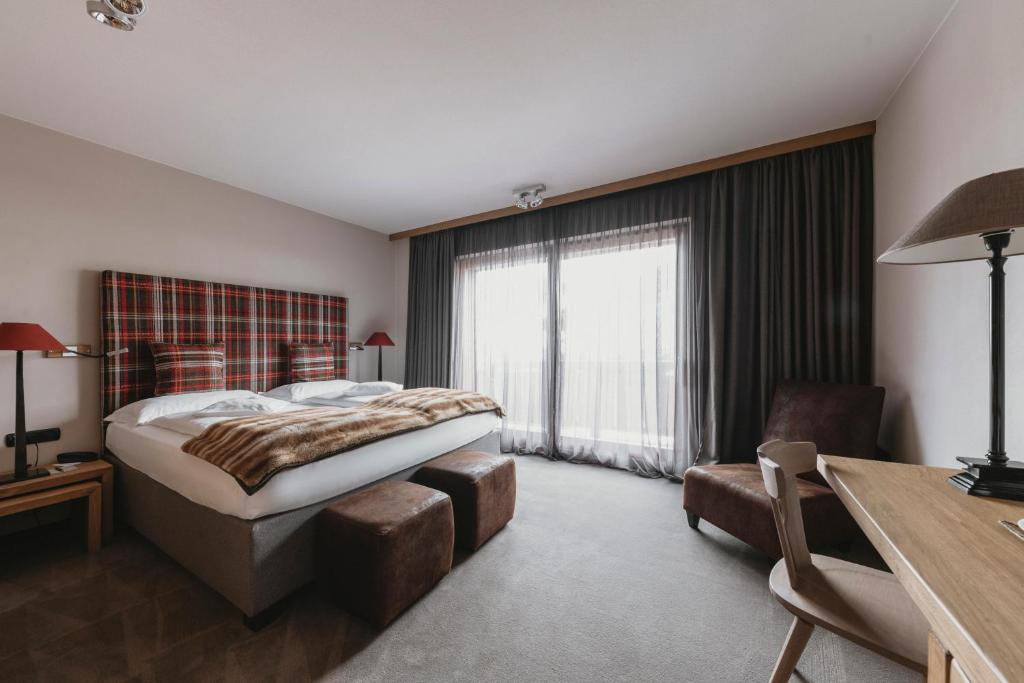 Postel nebo postele na pokoji v ubytování Eco & Wellness Boutique Hotel Sonne