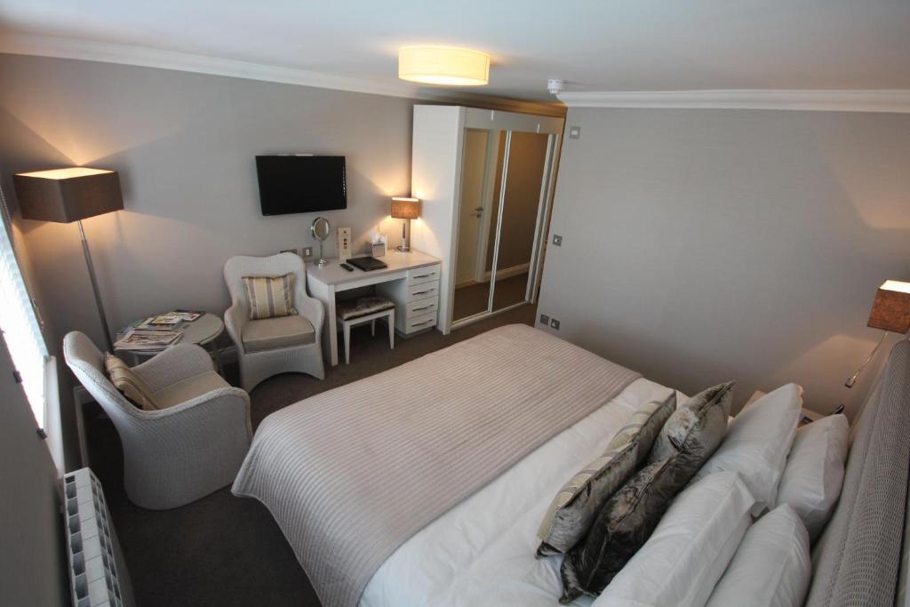 Postel nebo postele na pokoji v ubytování Hotel La Place