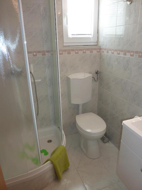 Koupelna v ubytování Apartments Ori