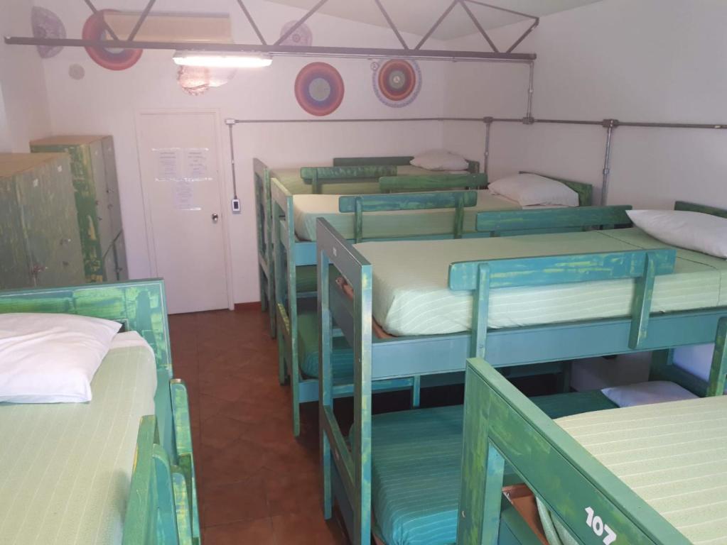 Postel nebo postele na pokoji v ubytování Hostel del Puerto