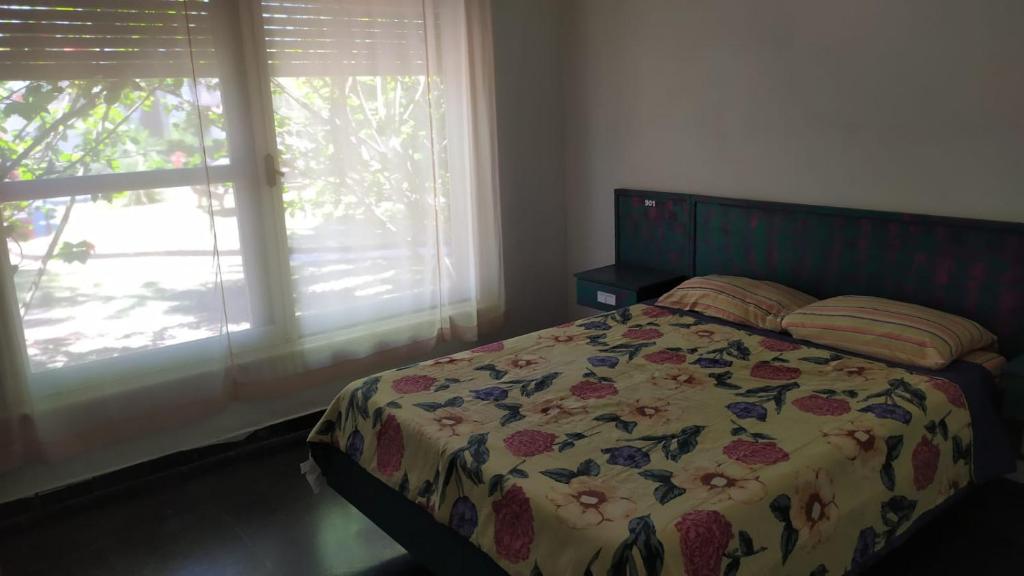 Postel nebo postele na pokoji v ubytování Hostel del Puerto