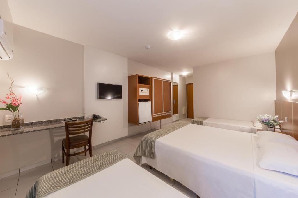 Postel nebo postele na pokoji v ubytování Hotel GAPH Maringa - Economico Mini Resort