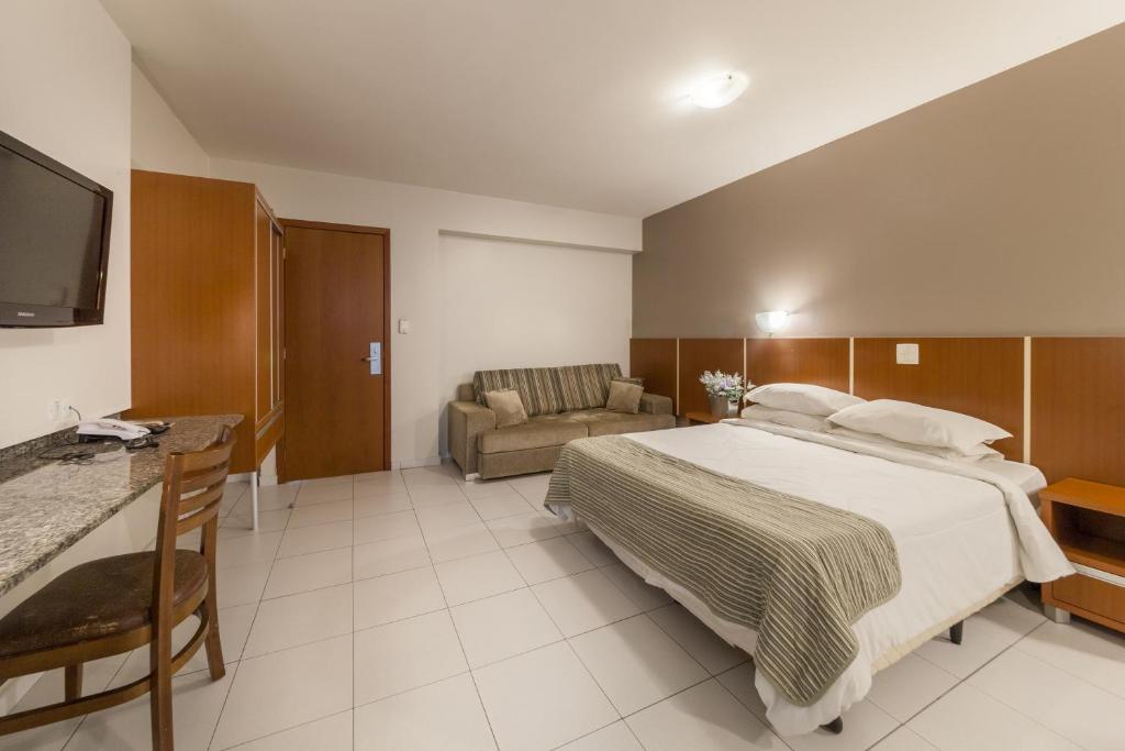 Postel nebo postele na pokoji v ubytování Hotel GAPH Maringa - Economico Mini Resort