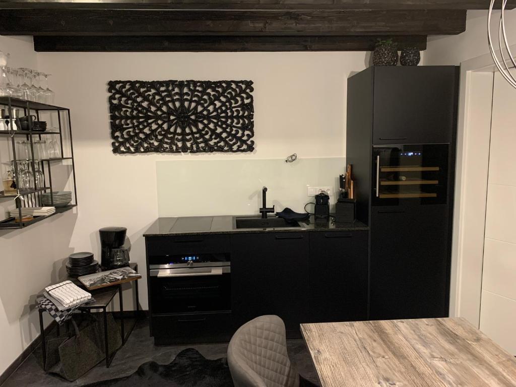 Kuchyň nebo kuchyňský kout v ubytování Chalet Mirandum Apartments Vandans