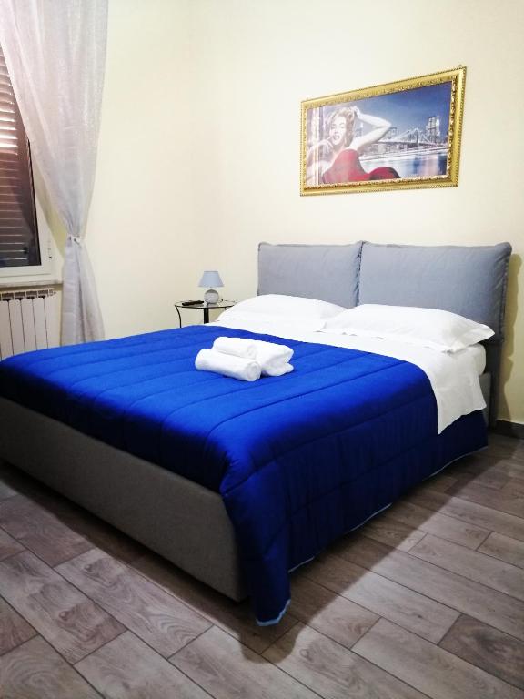 Postel nebo postele na pokoji v ubytování B&B Metropolitan RC