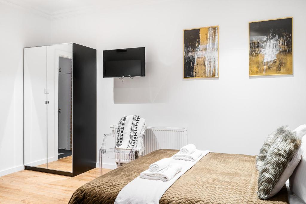 Posteľ alebo postele v izbe v ubytovaní Main Square Apartments - LoftAffair