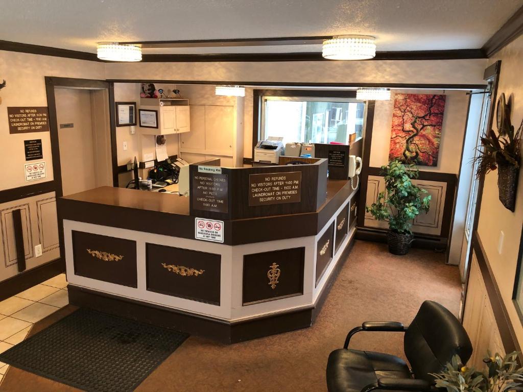 a room with a counter with boxes on it at Jockey Motel in Edmonton