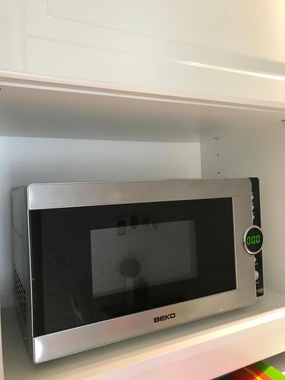 Kuchyňa alebo kuchynka v ubytovaní Apartament Calamo Tuwima Park