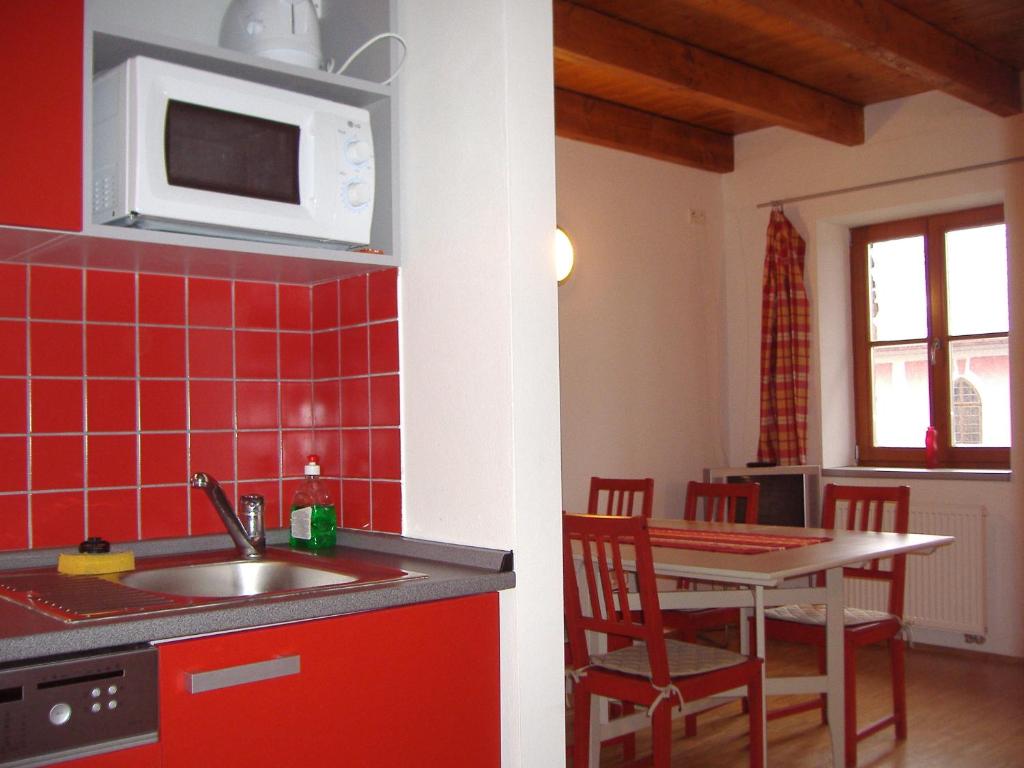 Kuchyň nebo kuchyňský kout v ubytování Apartmány Nové Hutě