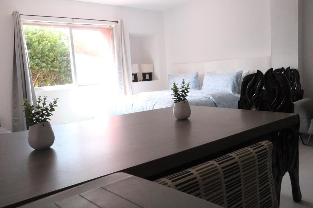 Postel nebo postele na pokoji v ubytování Casa de los Sueños Hotel Boutique