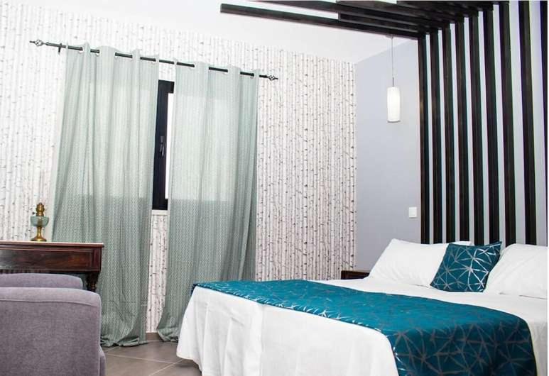 Postel nebo postele na pokoji v ubytování Aparthotel Palace