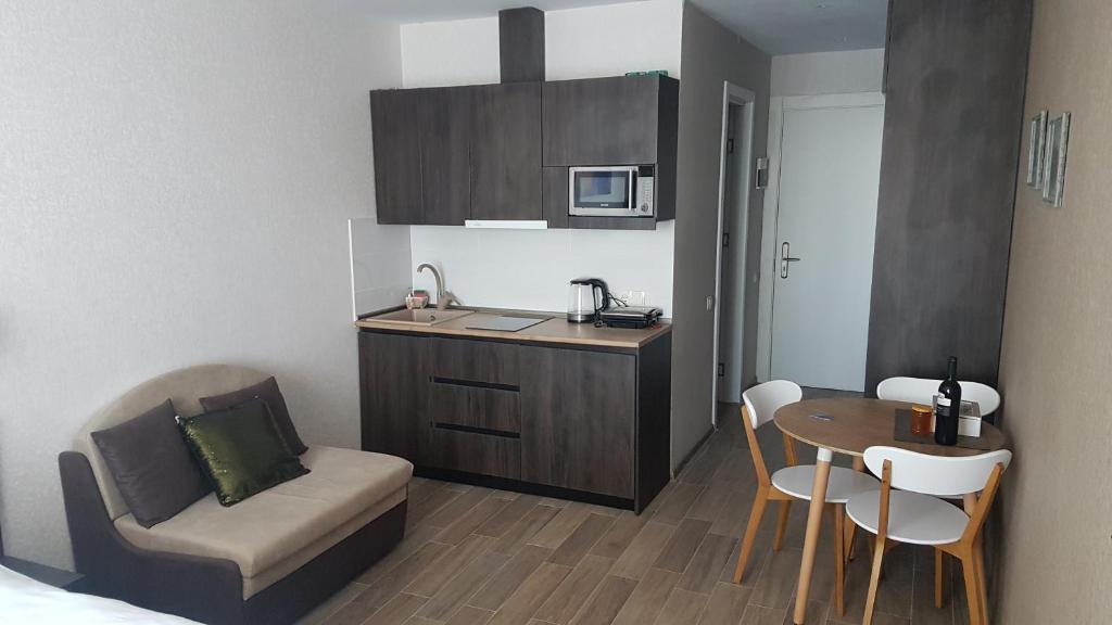 Kuchyň nebo kuchyňský kout v ubytování New Gudauri Loft II studio 553