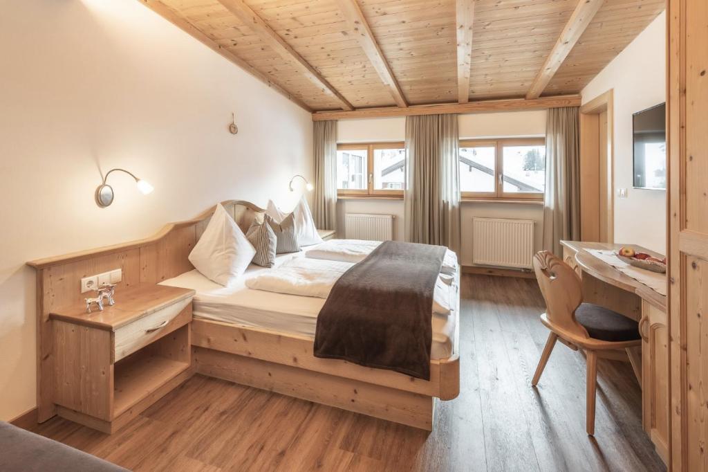 Postel nebo postele na pokoji v ubytování Villa David Dolomites