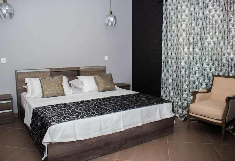 Postel nebo postele na pokoji v ubytování Aparthotel Palace