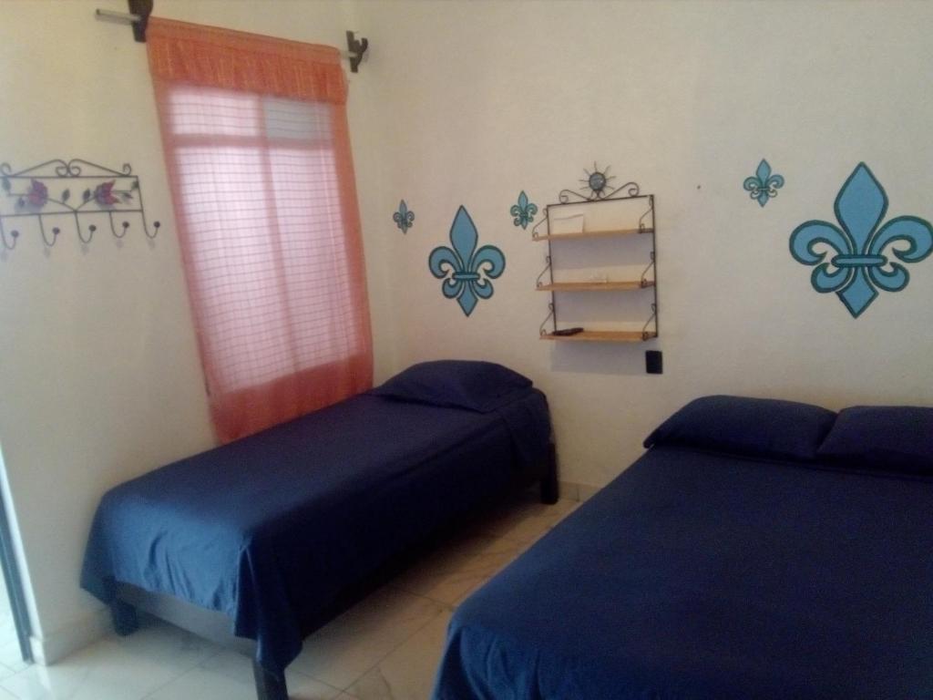 Postel nebo postele na pokoji v ubytování Casa Santuario Hotel Boutique