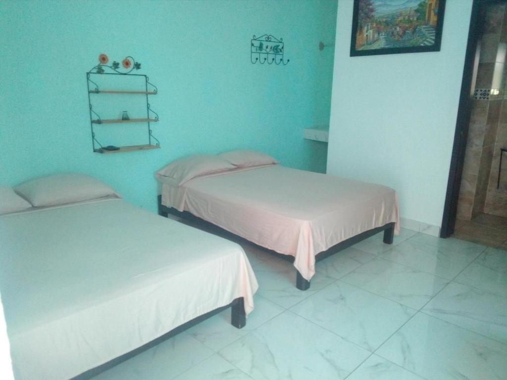 Postel nebo postele na pokoji v ubytování Casa Santuario Hotel Boutique