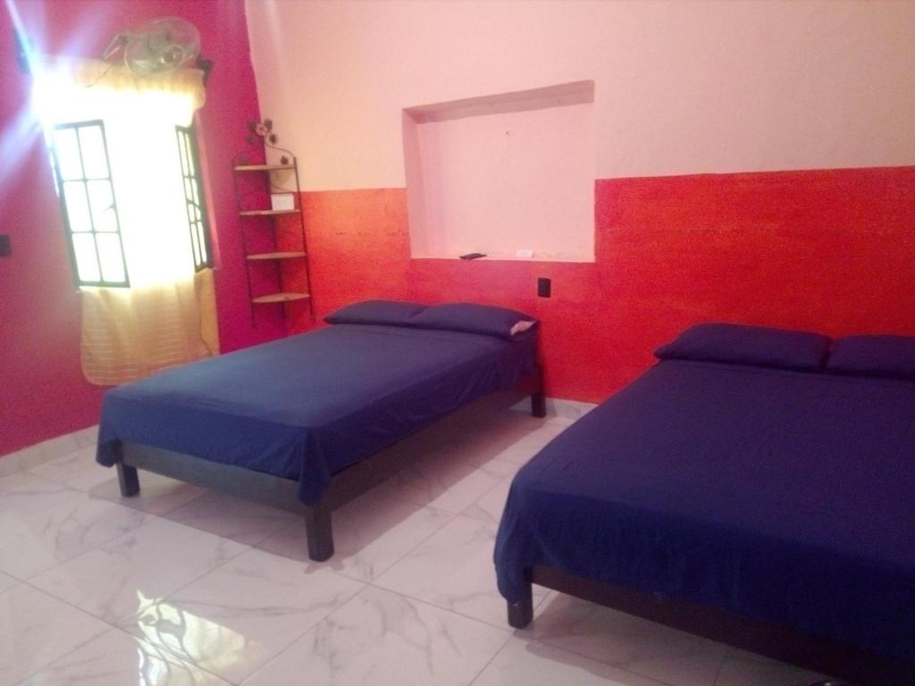 Postel nebo postele na pokoji v ubytování Casa Santuario Hotel Boutique