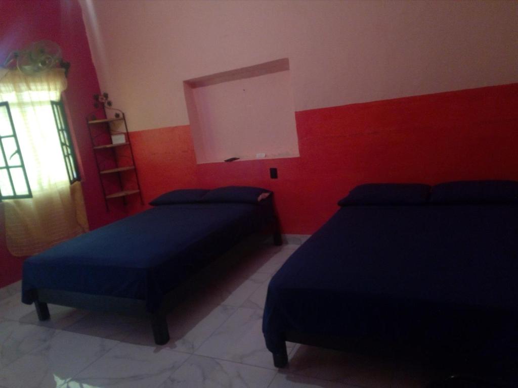 Postel nebo postele na pokoji v ubytování Casa Santuario Hotel Boutique