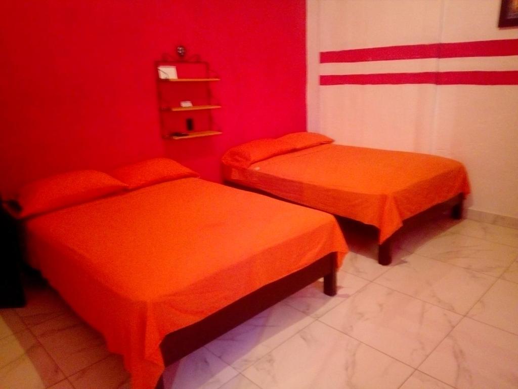 Postel nebo postele na pokoji v ubytování Casa Santuario Hotel Boutique