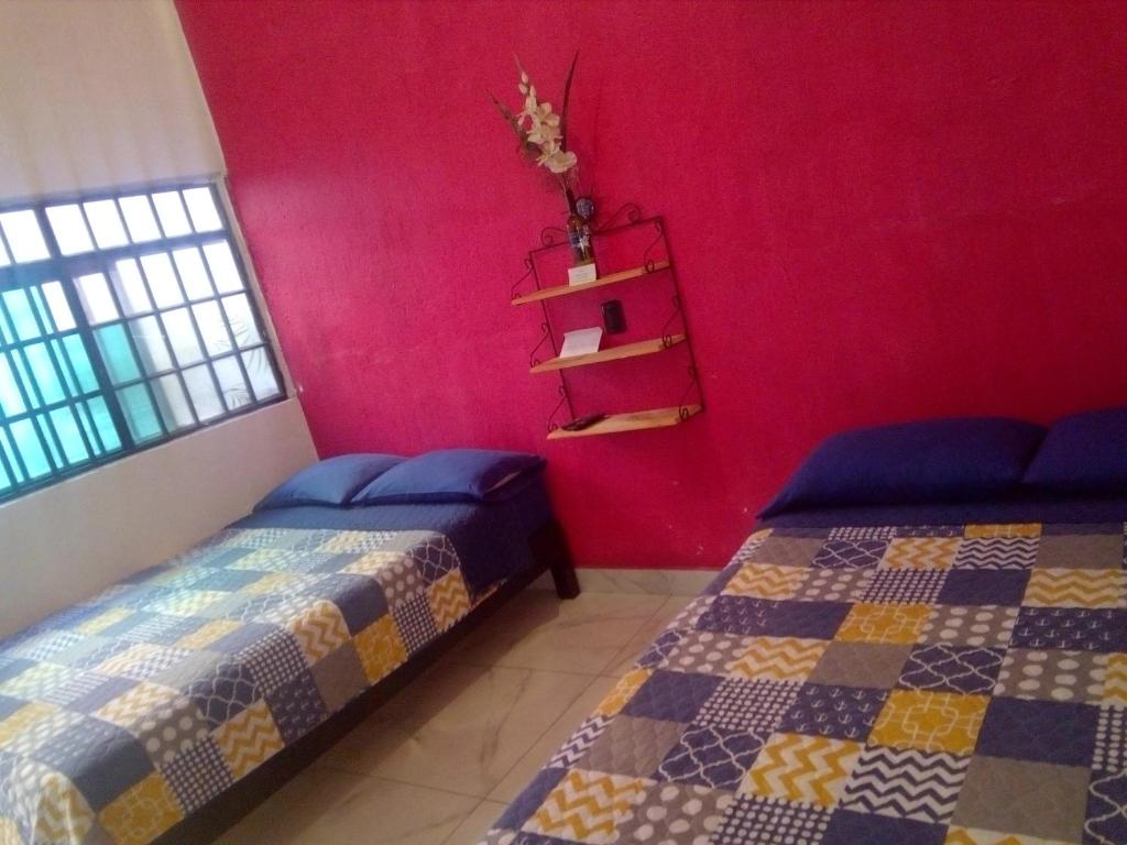 Postel nebo postele na pokoji v ubytování Casa Santuario Hotel Boutique