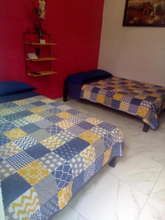 Postel nebo postele na pokoji v ubytování Casa Santuario Hotel Boutique
