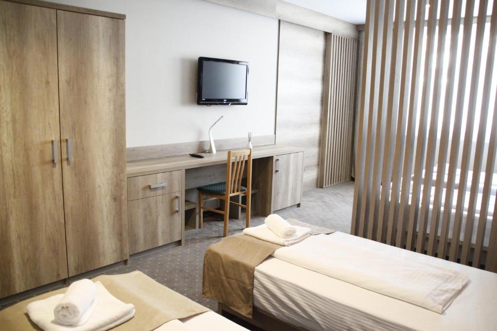 Postel nebo postele na pokoji v ubytování Student Hotel Mostar