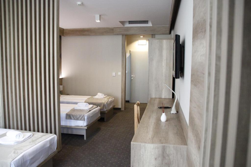 Postel nebo postele na pokoji v ubytování Student Hotel Mostar