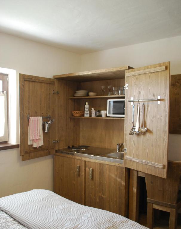 Kuchyň nebo kuchyňský kout v ubytování Panonska Vas Apartments
