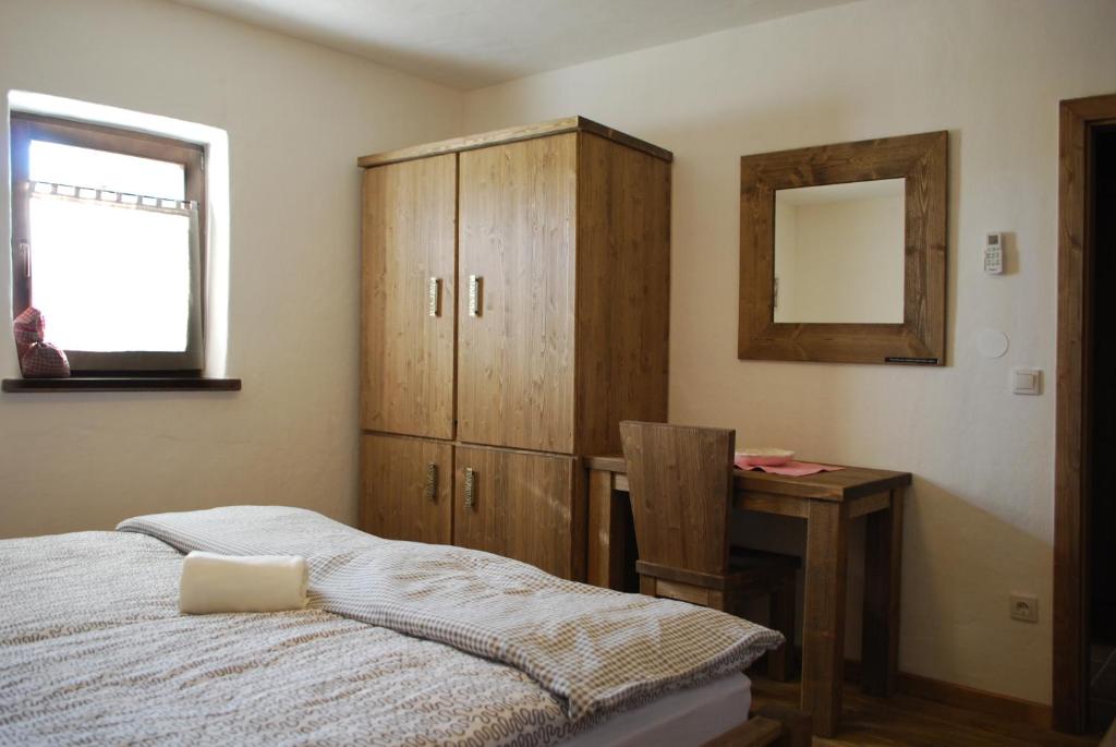 Postel nebo postele na pokoji v ubytování Panonska Vas Apartments