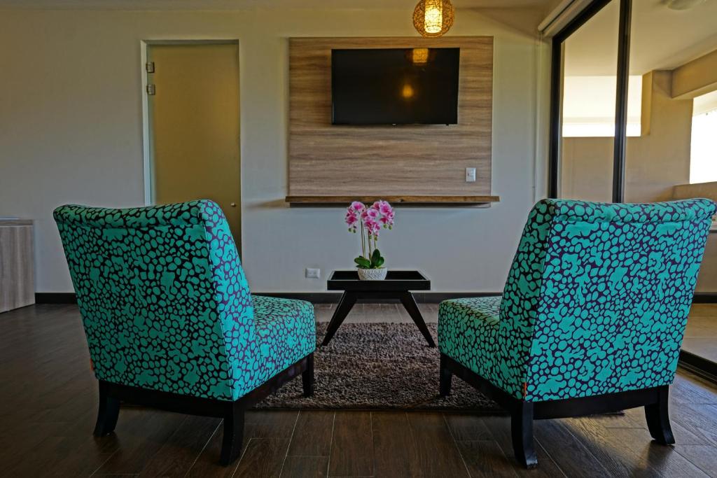 Posezení v ubytování Nammbú Beach Front Bungalows