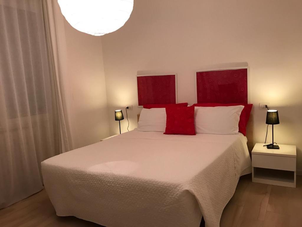 Krevet ili kreveti u jedinici u okviru objekta Ascoli Bonjour b&b & Apartments Parcheggio Privato & Giardino