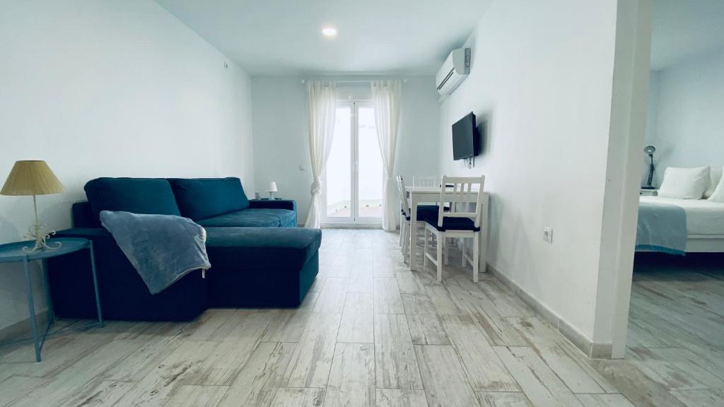 Televízia a/alebo spoločenská miestnosť v ubytovaní CLB F. Rubio Apartment