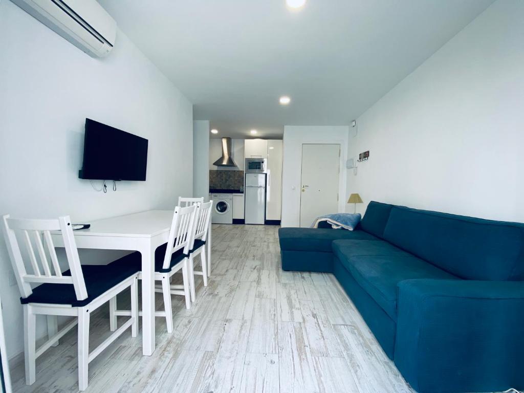 Televízia a/alebo spoločenská miestnosť v ubytovaní CLB F. Rubio Apartment