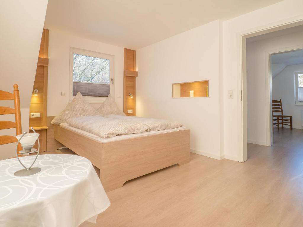Postel nebo postele na pokoji v ubytování Ferienhaus Gretel in Zorge