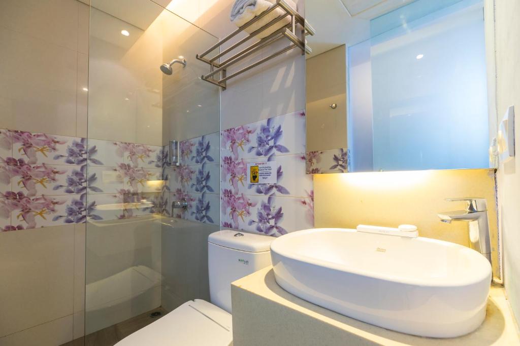 Koupelna v ubytování Royal City Hotel Jakarta