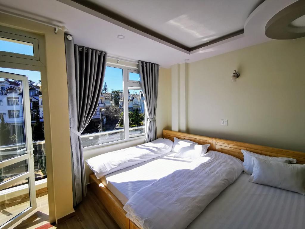 Postel nebo postele na pokoji v ubytování Sơn Liễu Homestay