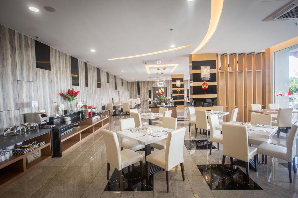 Posezení v ubytování Lintas Platinum Hotel