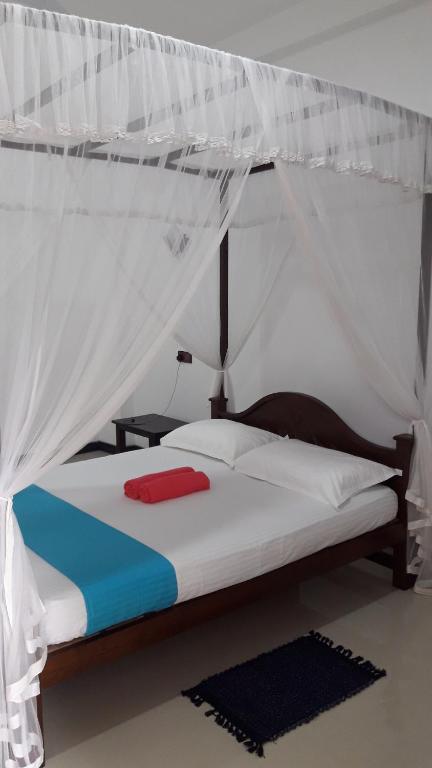 Postel nebo postele na pokoji v ubytování Ramesh Guesthouse