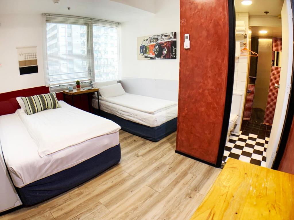 Letto o letti in una camera di Yesinn @YMT