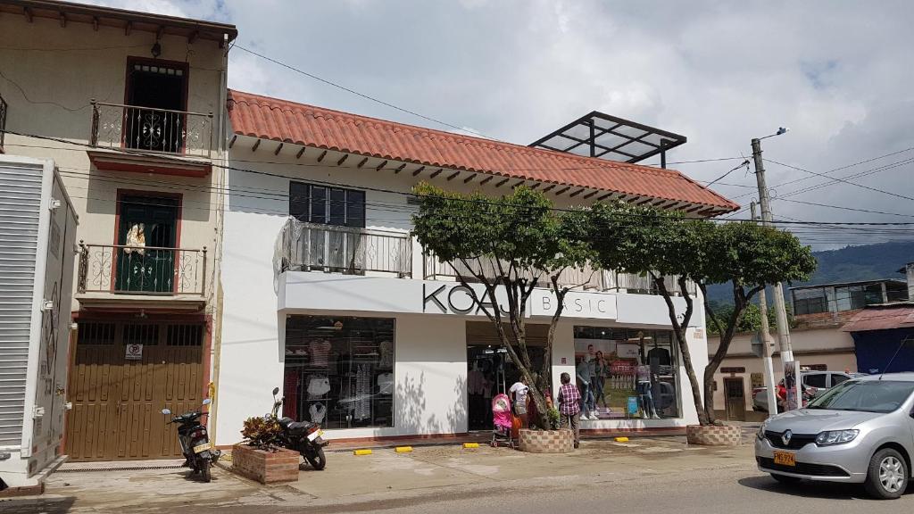 a building with a car parked in front of it at Apolonia Boutique in Guaduas
