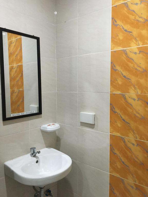 Koupelna v ubytování Downtown Suites