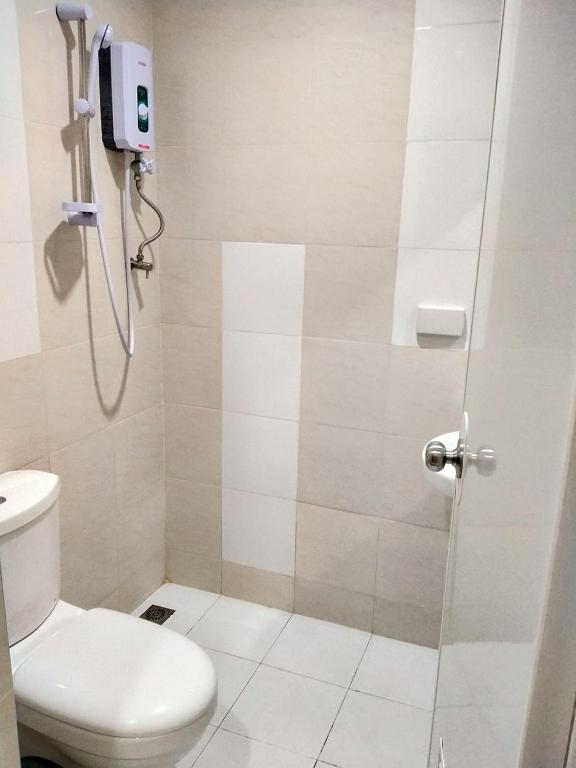 Koupelna v ubytování Downtown Suites