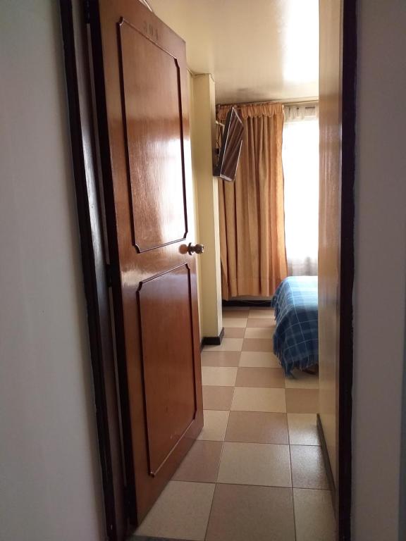 Postel nebo postele na pokoji v ubytování Hotel Plata