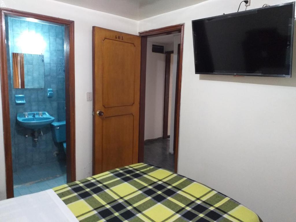 TV a/nebo společenská místnost v ubytování Hotel Plata