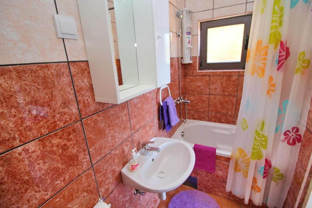 Koupelna v ubytování Apartments Filipović