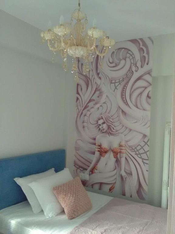 Postel nebo postele na pokoji v ubytování Divine Luxury Apartments