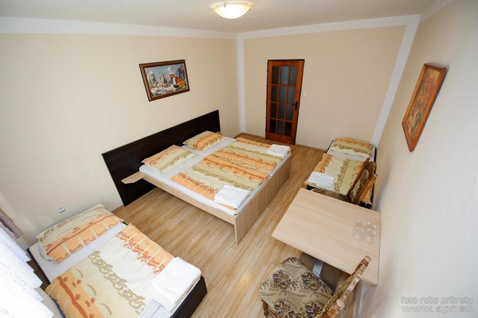 Posteľ alebo postele v izbe v ubytovaní Horský hotel Eva