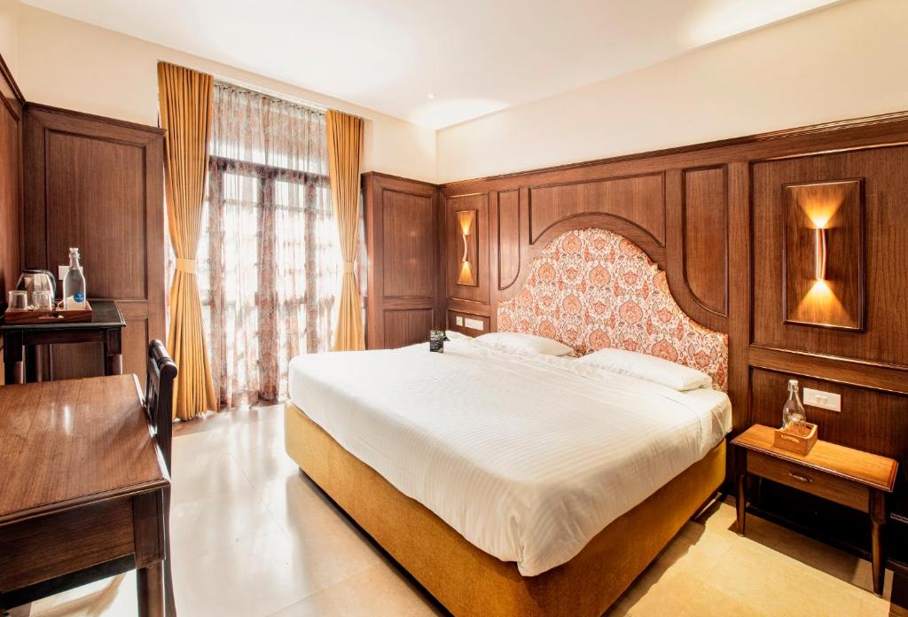 Postel nebo postele na pokoji v ubytování Hotel Raindrops