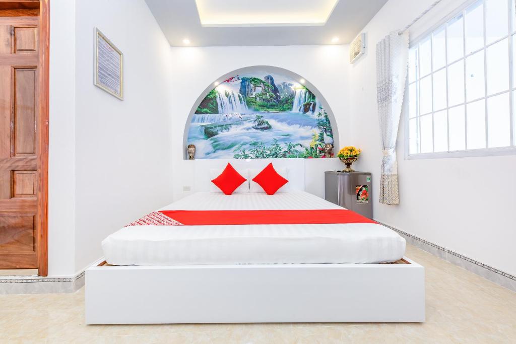 Кровать или кровати в номере Super OYO 598 Peony Hotel