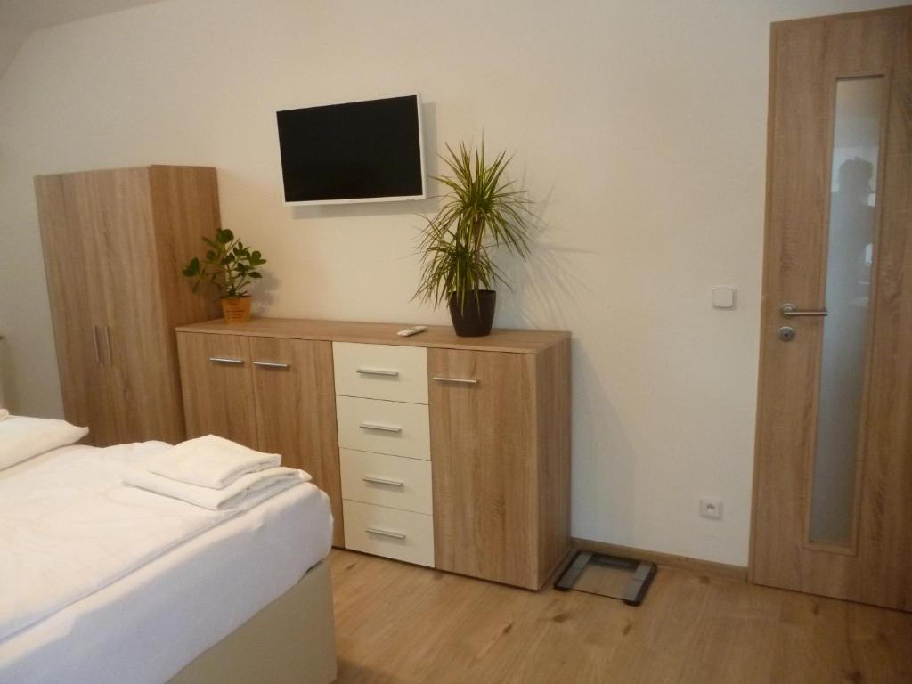 Postel nebo postele na pokoji v ubytování Pension Pugner